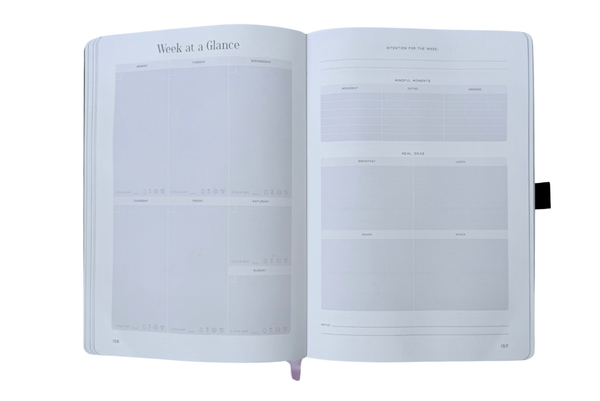 Open planner with weekly layout on a white background